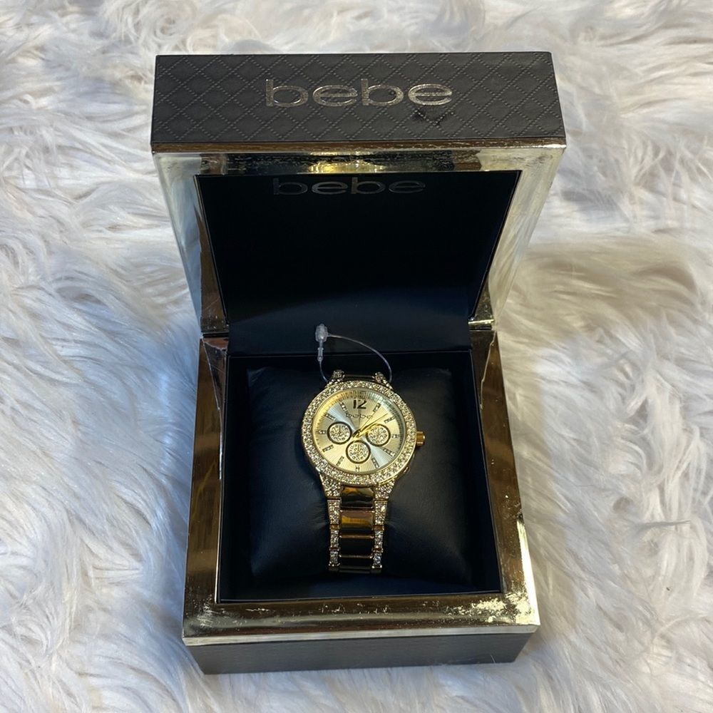 BEBE GOLD AND DIAMOND WATCH